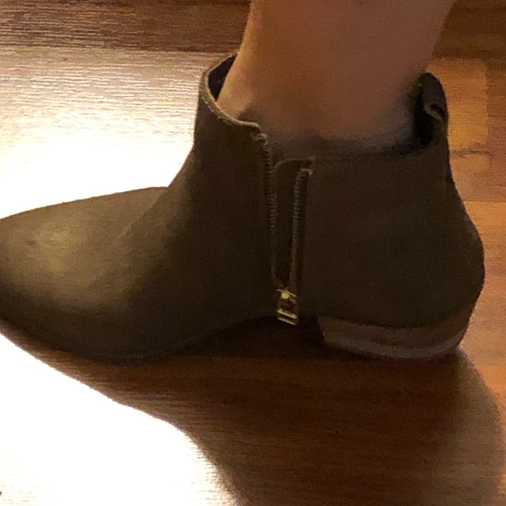 Ankle booties color has a slight gold shimmer